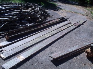 old fencing boards getting a new life in the garden