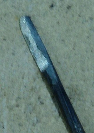  a hook with an inside bevel for the particular cuts 
