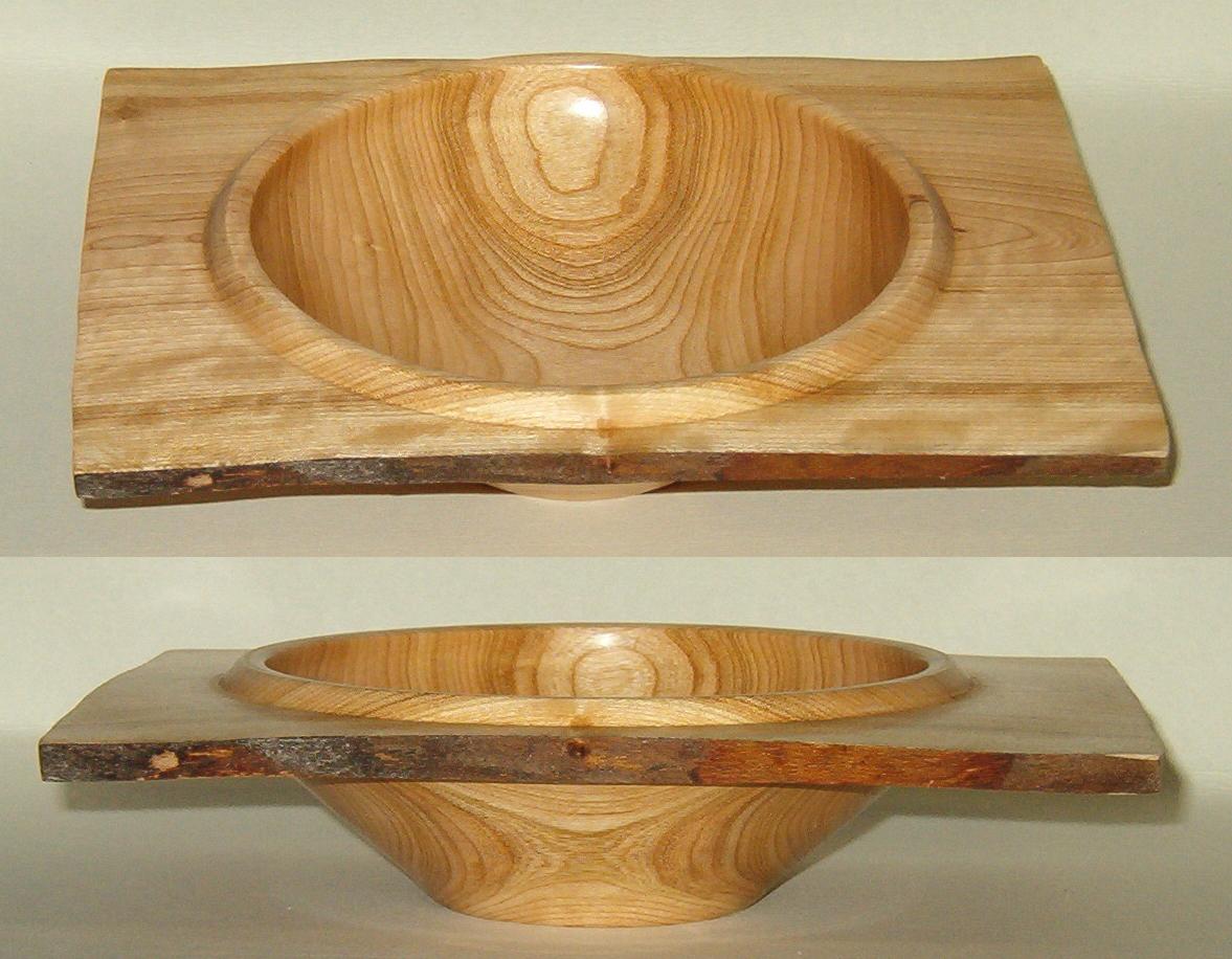   rectangular bowl in black cherry about 10 inches long by 9 wide and three high