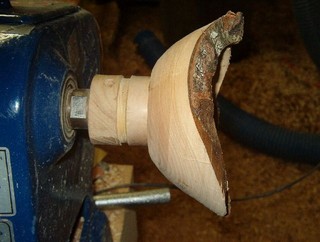 replace the bowl blank on the lathe