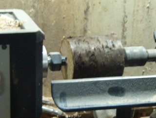 work on lathe between centers