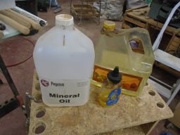   mineral oil, vegetable oil and a small bottle of the two mixed 