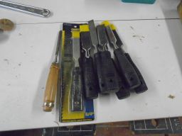 	an assortment of chisels I got from a dollar store	