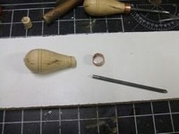 	The head of the nail is removed by grinding or cutting in some fashion. 	