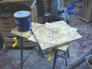 scrap plywood connected with  lazy Susan bearing 
